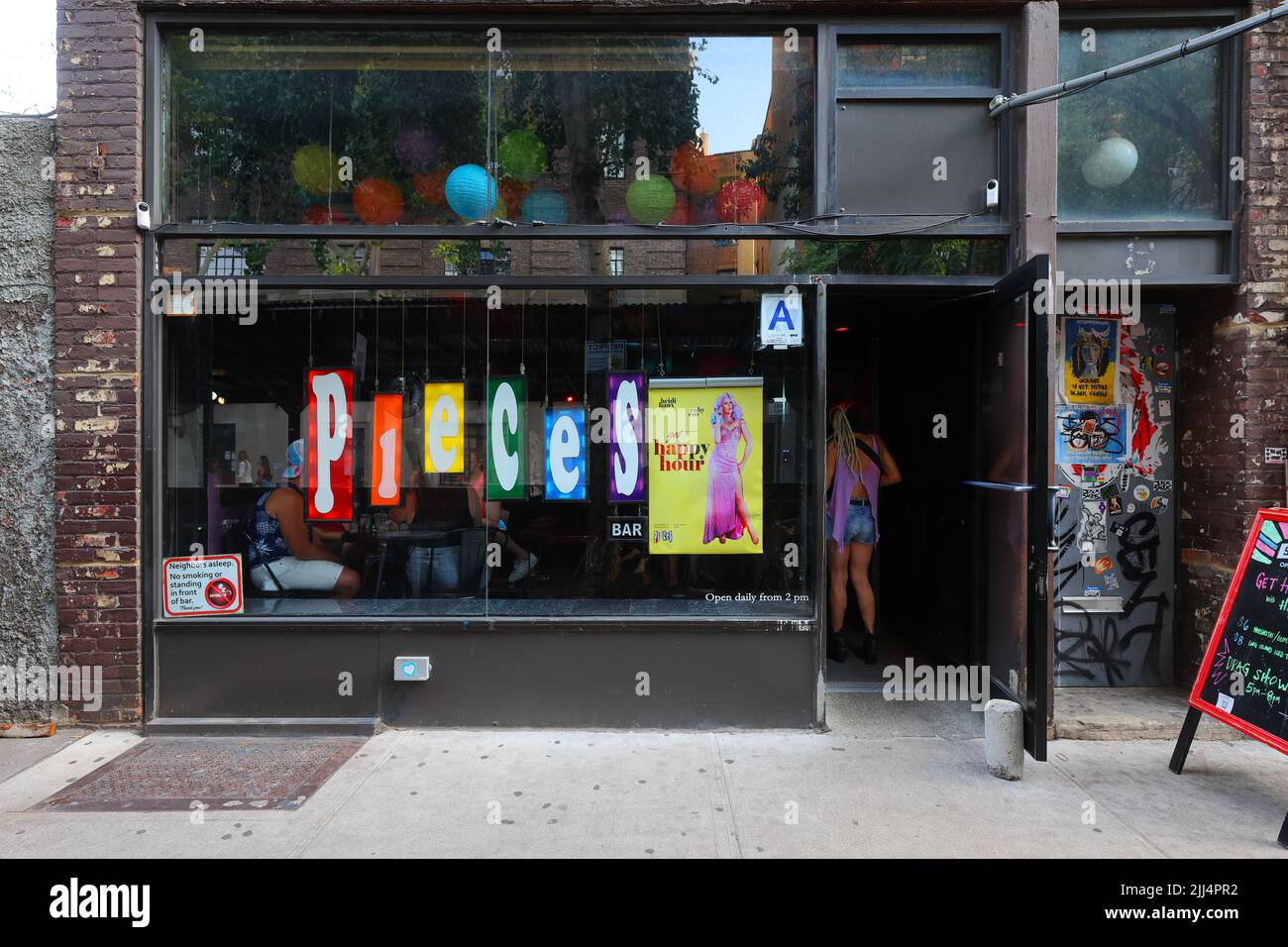Pieces, 8 Christopher St, New York, NYC storefront photo of a gay bar in the Greenwich Village neighborhood in Manhattan. Stock Photo
