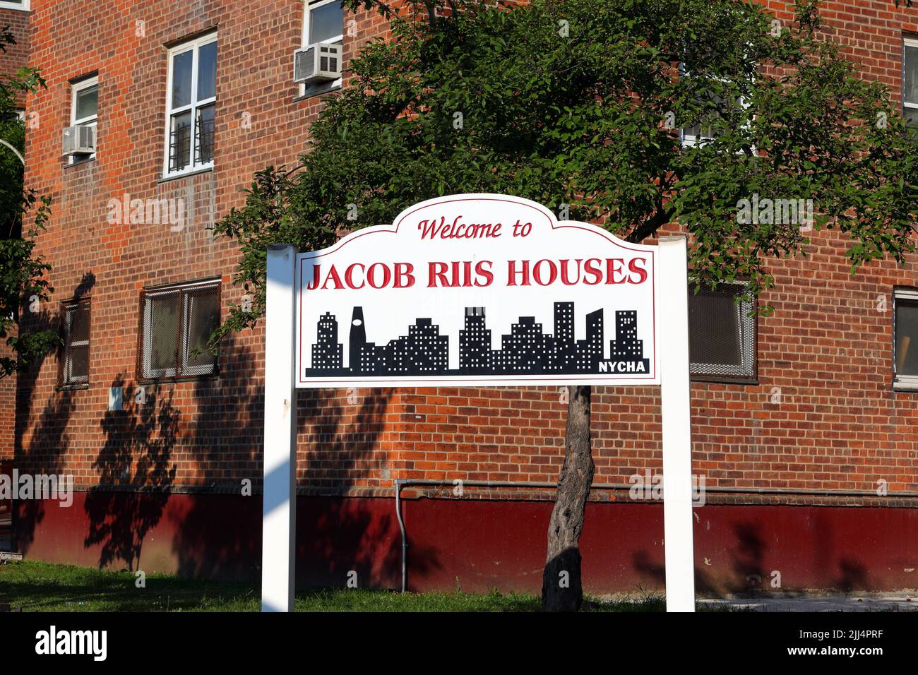 Signage for New York City Housing Authority Jacob Riis Houses in the Lower East Side neighborhood of Manhattan, New York, NY Stock Photo