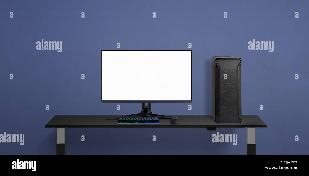 Gaming computer on desk. Isolated display for game promotion. Purple
