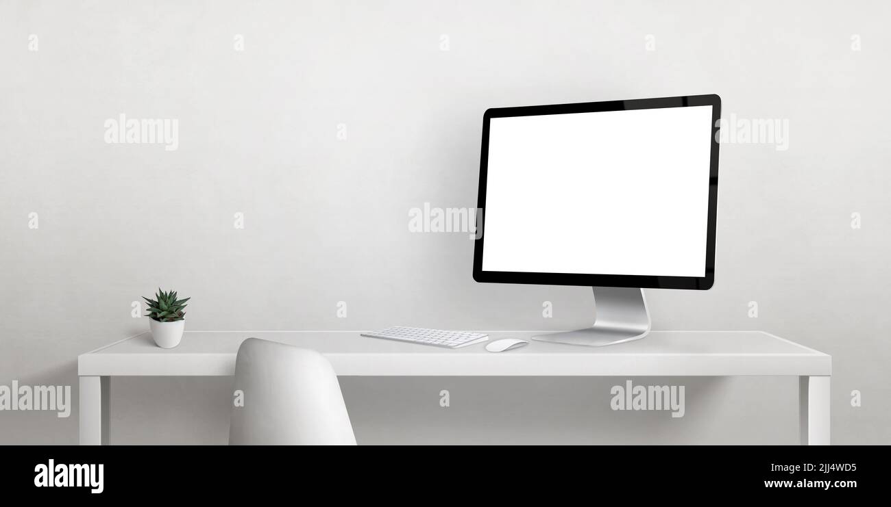 Computer display mockup on work desk with copy space beside on white wall. Isolated display screen for web page promotion Stock Photo