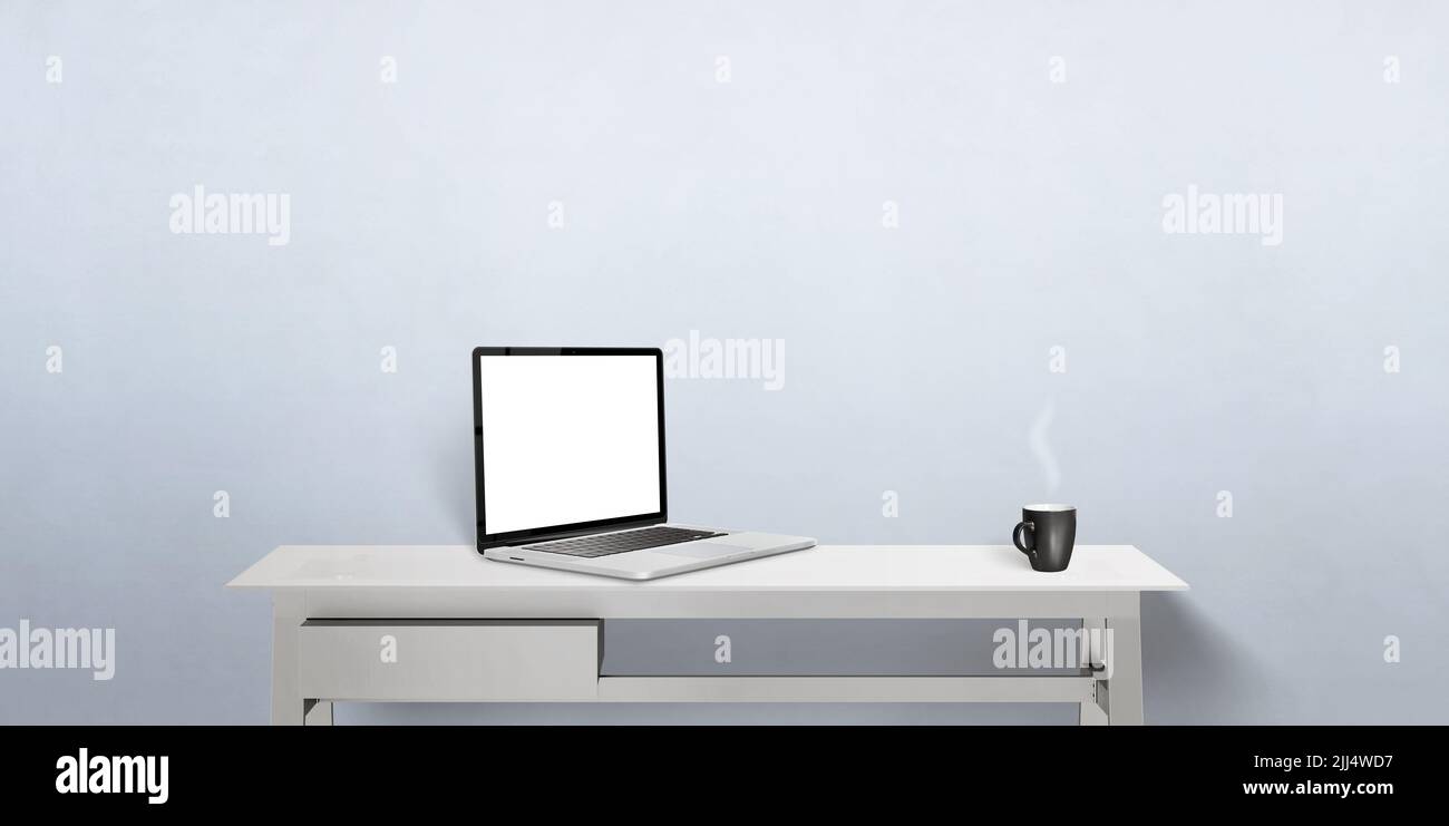 Laptop computer mockup on work desk. Front view. Notebook with isolated display for web page promotion. Coffee mug beside Stock Photo