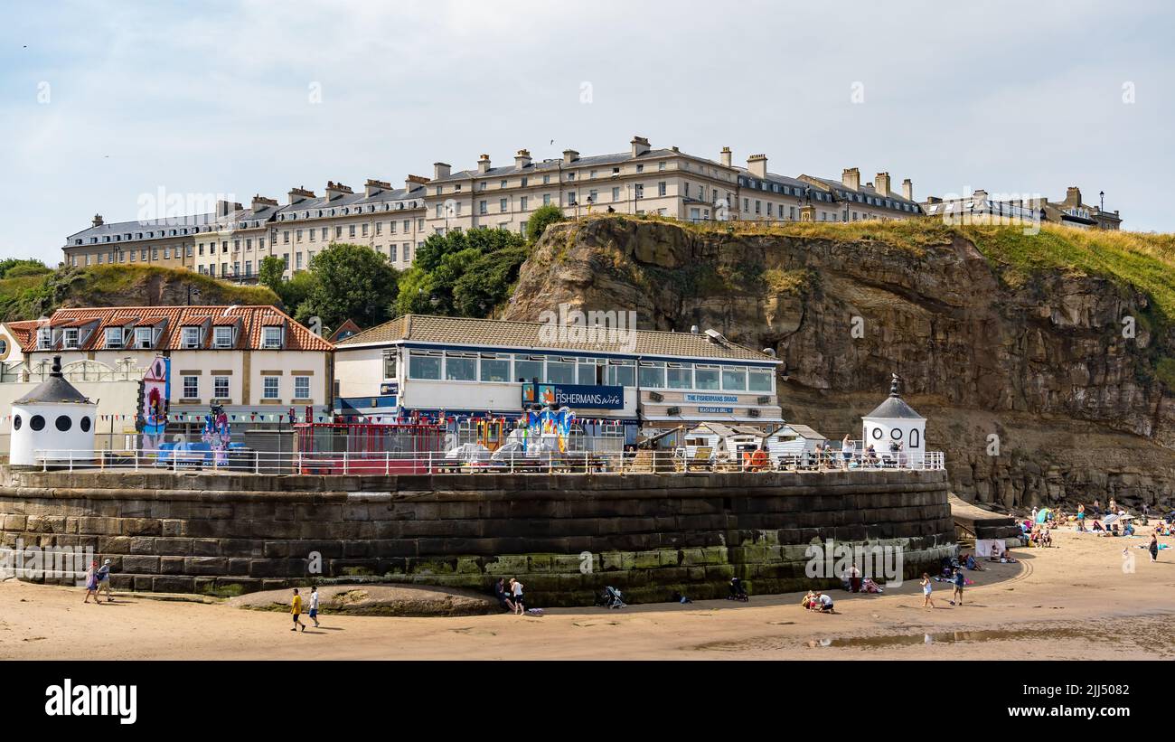 WHITBY,  NORTH YORKSHIRE, UK - JULY 19: View of the sea front in Whitby, North Yorkshire on July 19, 2022. Unidentified people Stock Photo