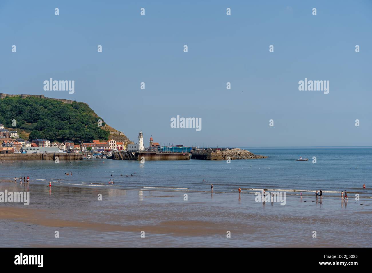 SCARBOROUGH,  NORTH YORKSHIRE, UK - JULY 18: View of the sea front in Scarborough, North Yorkshire on July 18, 2022. Unidentified people Stock Photo