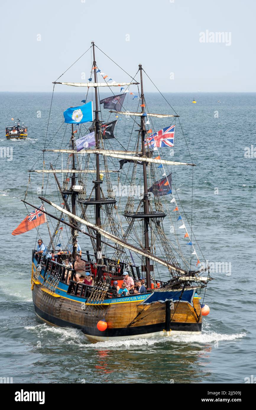WHITBY,  NORTH YORKSHIRE, UK - JULY 19: Replica galleon pleasure boat heading into Whitby, North Yorkshire on July 19, 2022. Unidentified people Stock Photo