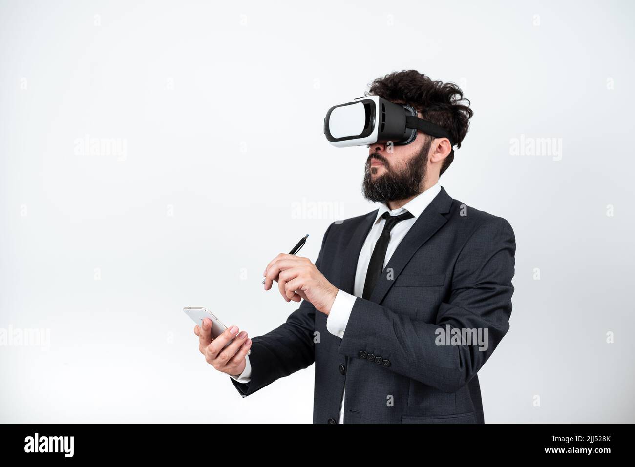 Man Holding Mobile Phone, Wearing Vr Glasses And Pointing On Recent