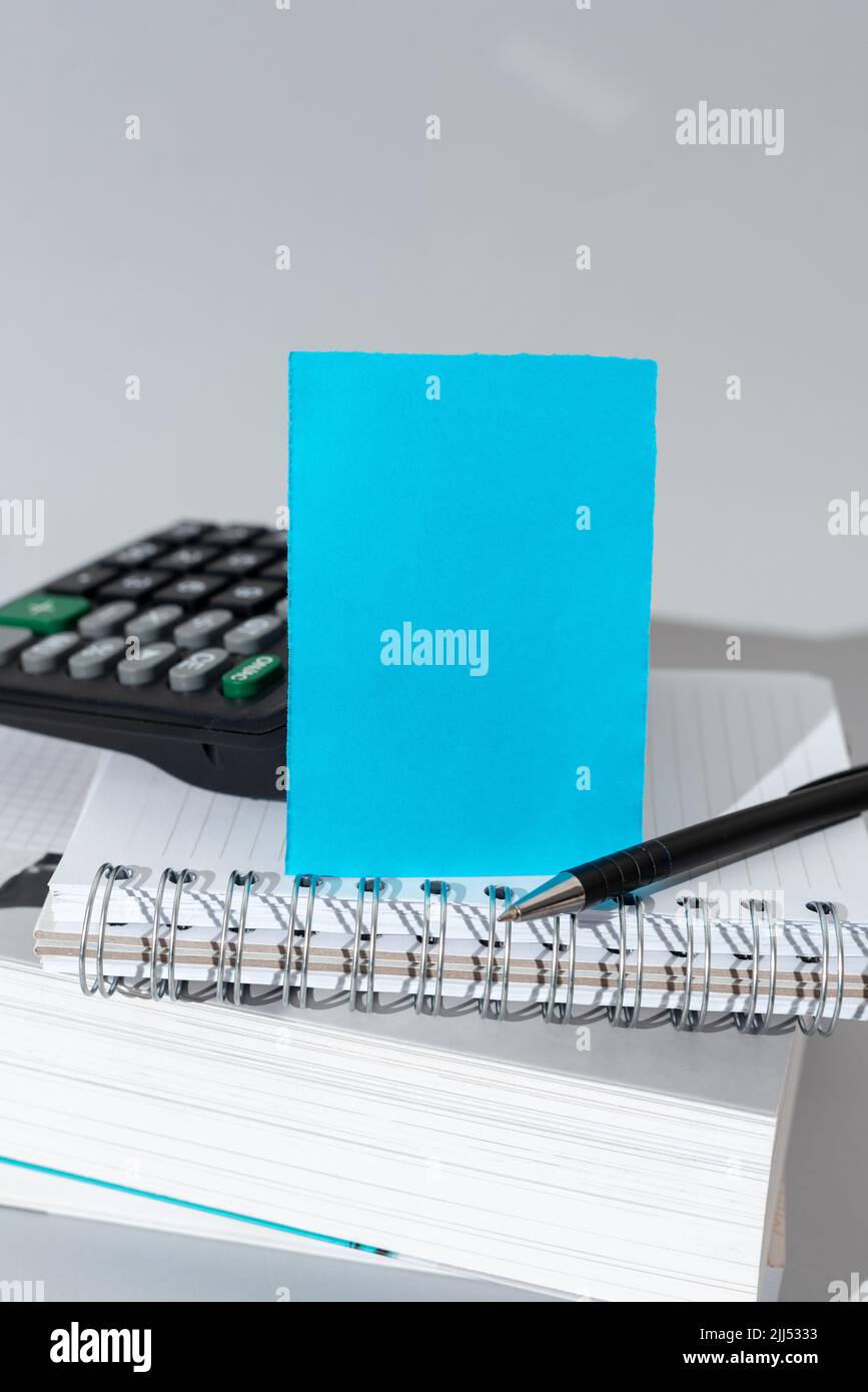 Important Message Presented On Piece Of Paper On Desk With Calculator, Books, Pen And Notebook. Crutial Information Written On Note. New Ideas Stock Photo