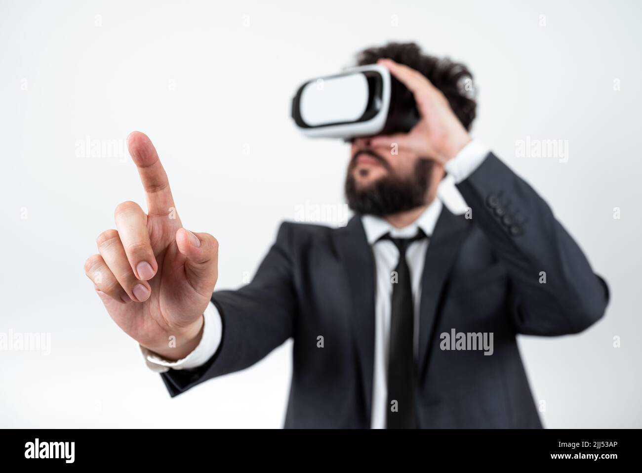 Man Wearing Vr Glasses And Pointing On Important Messages With One