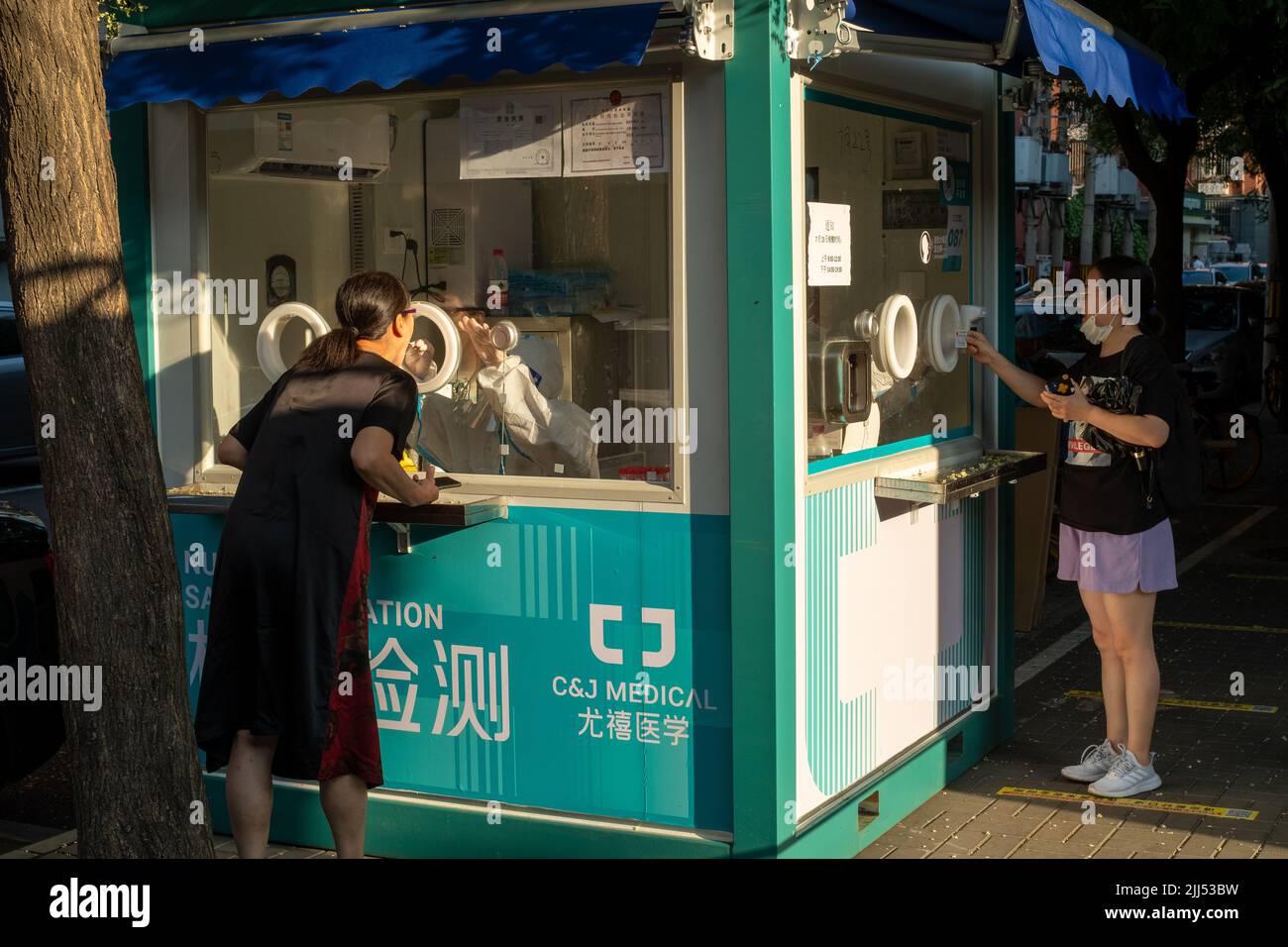 A Nucleic Acid Sampling Station in Beijing, China. China builds thousands of Testing Booths to live with Covid-19. Jul-23-2022 Stock Photo