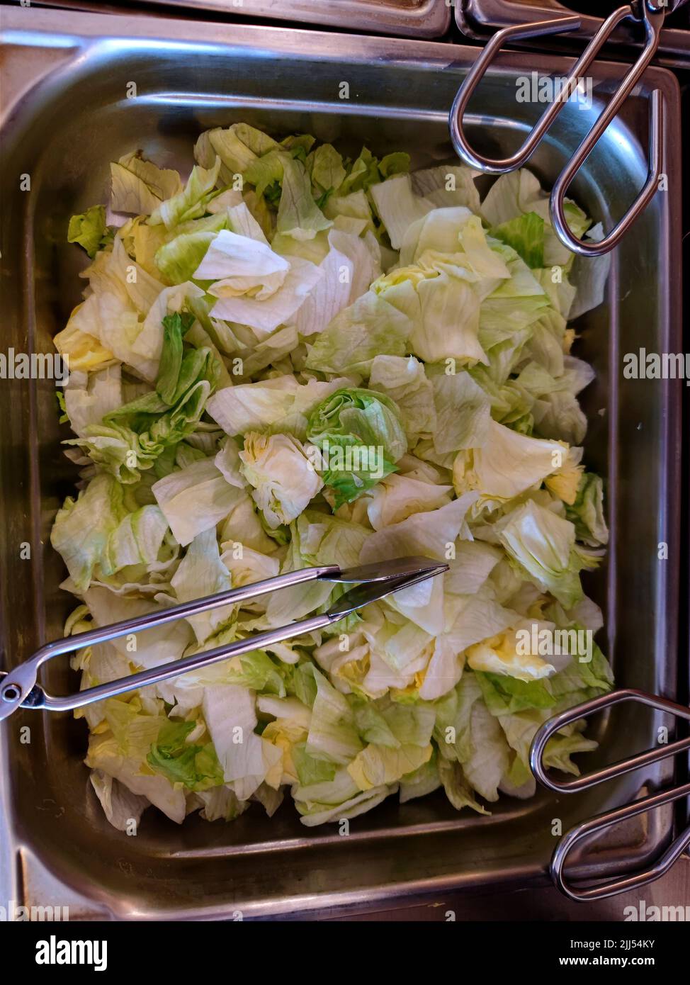 Fresh cabbage in a cooling tray in a restaurant Stock Photo