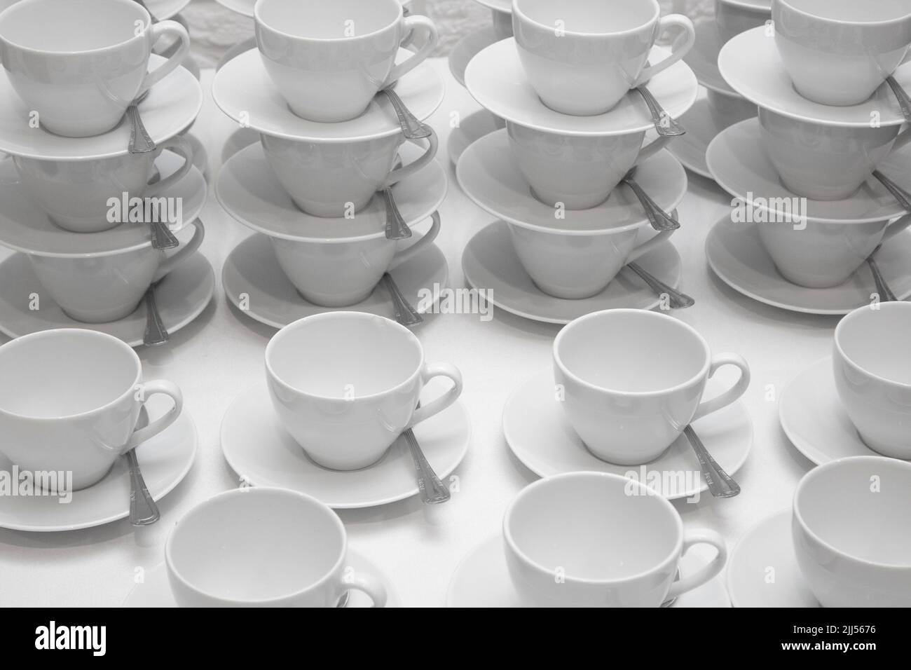 white cups and saucers for coffe and tea Stock Photo