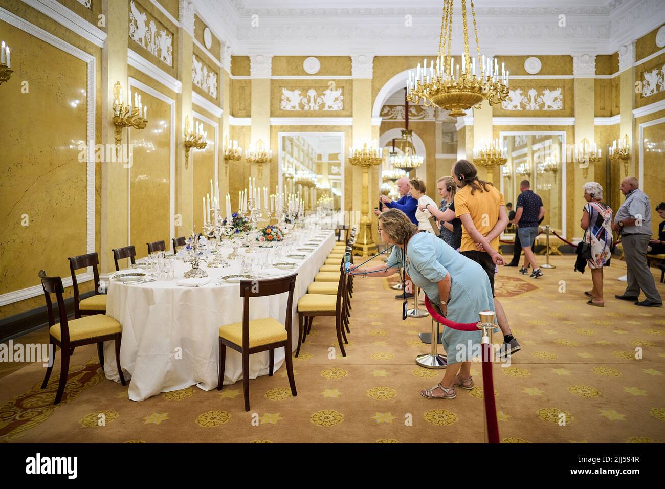 The Hague, Netherlands. 23rd July, 2022. 2022-07-23 11:52:05 THE HAGUE - Visitors walk through Noordeinde Palace. The palace and the Royal Stables are open to the public again in the summer months. ANP PHIL NIJHUIS netherlands out - belgium out Credit: ANP/Alamy Live News Stock Photo