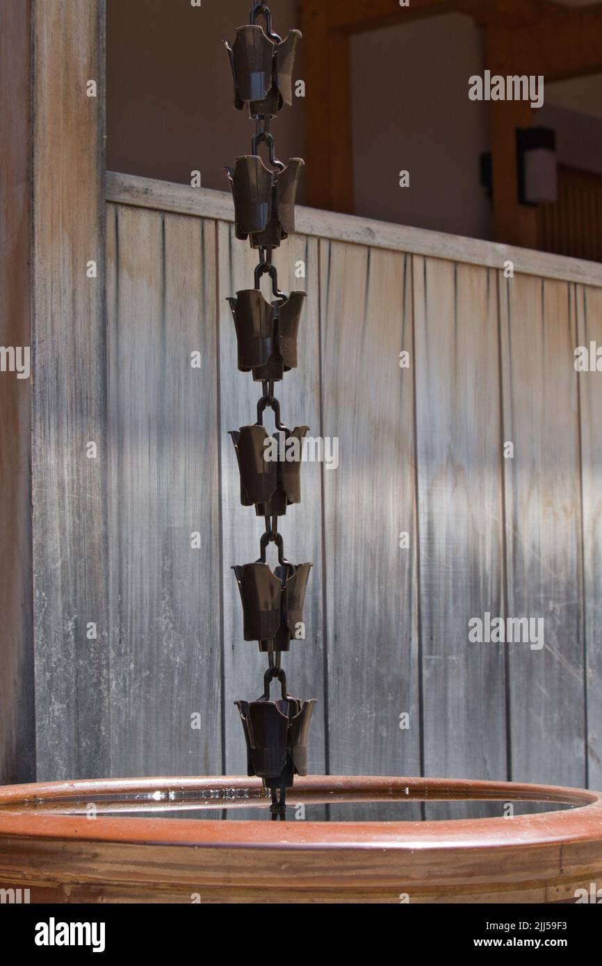 Traditional Japanese rain chain Stock Photo Alamy