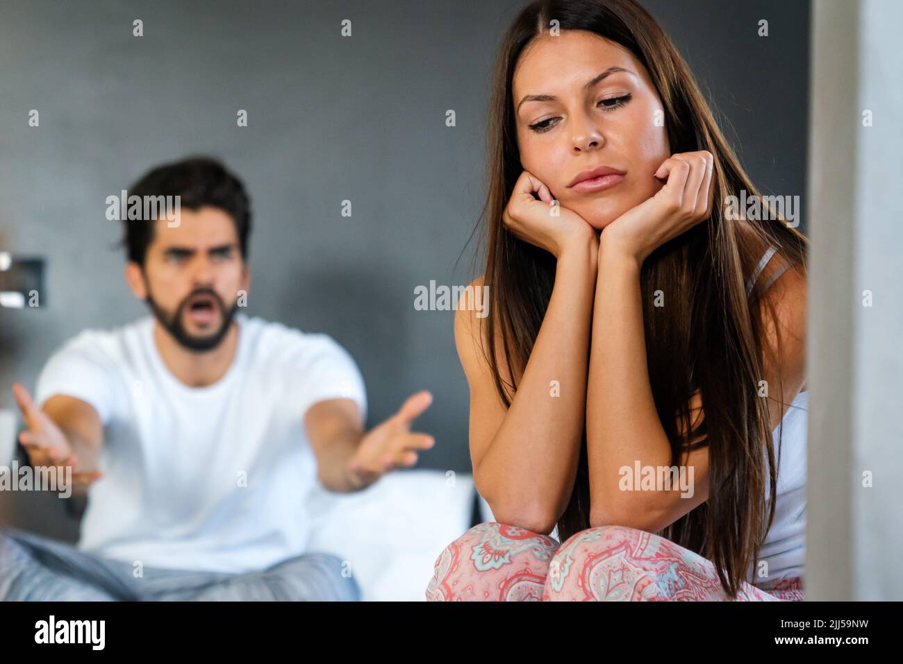 Frustrated couple arguing and having marriage problems. Domestic violence Stock Photo