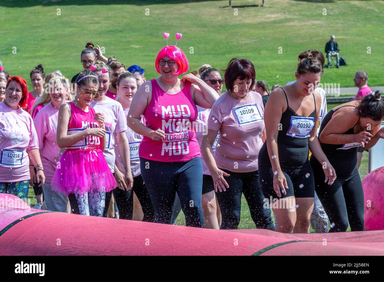Abington Park, Northampton, UK. 23rd July 2022. Race for Life Pretty Muddy, raising funds for Cancer Research, a  obstacle route which meanders through the very scenic Abington Park. Credit: Keith J Smith./Alamy Live News. Stock Photo