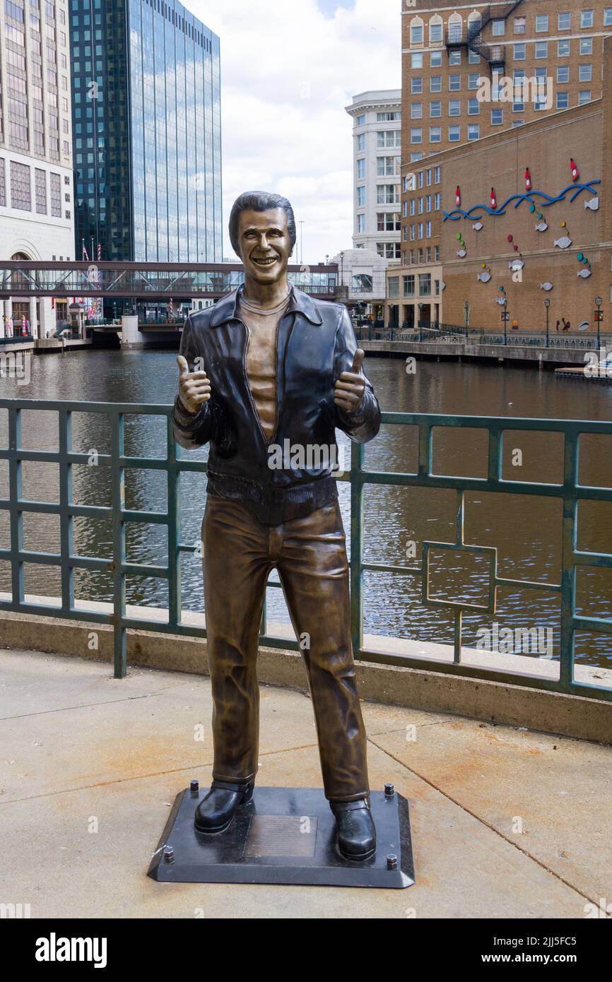 Milwaukee, WI, USA April 19 2022 Refurbished Bronze Fonz statue Happy Days character tribute in