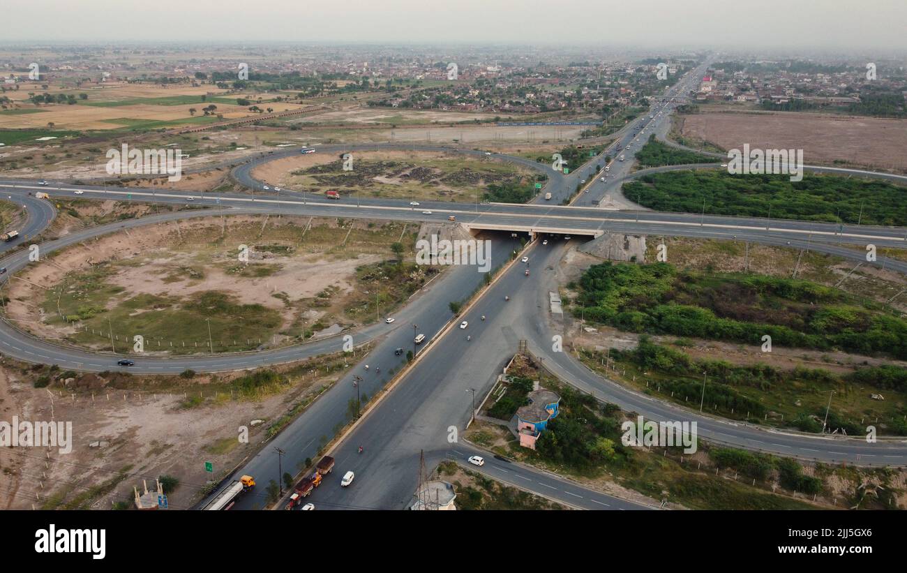 High Angle Footage and Aerial View of Pakistani Motorways M2 at Kala Shah Kaku Interchange to GT