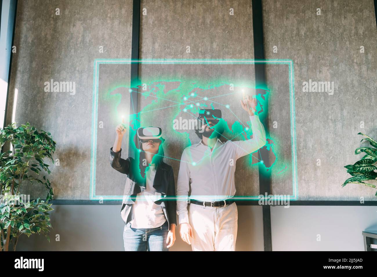 Multiracial business people with VR glasses using virtual visual map Stock Photo
