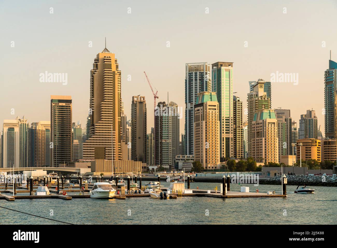 United Arab Emirates, Dubai, Dubai Marina with tall skyscrapers in background Stock Photo