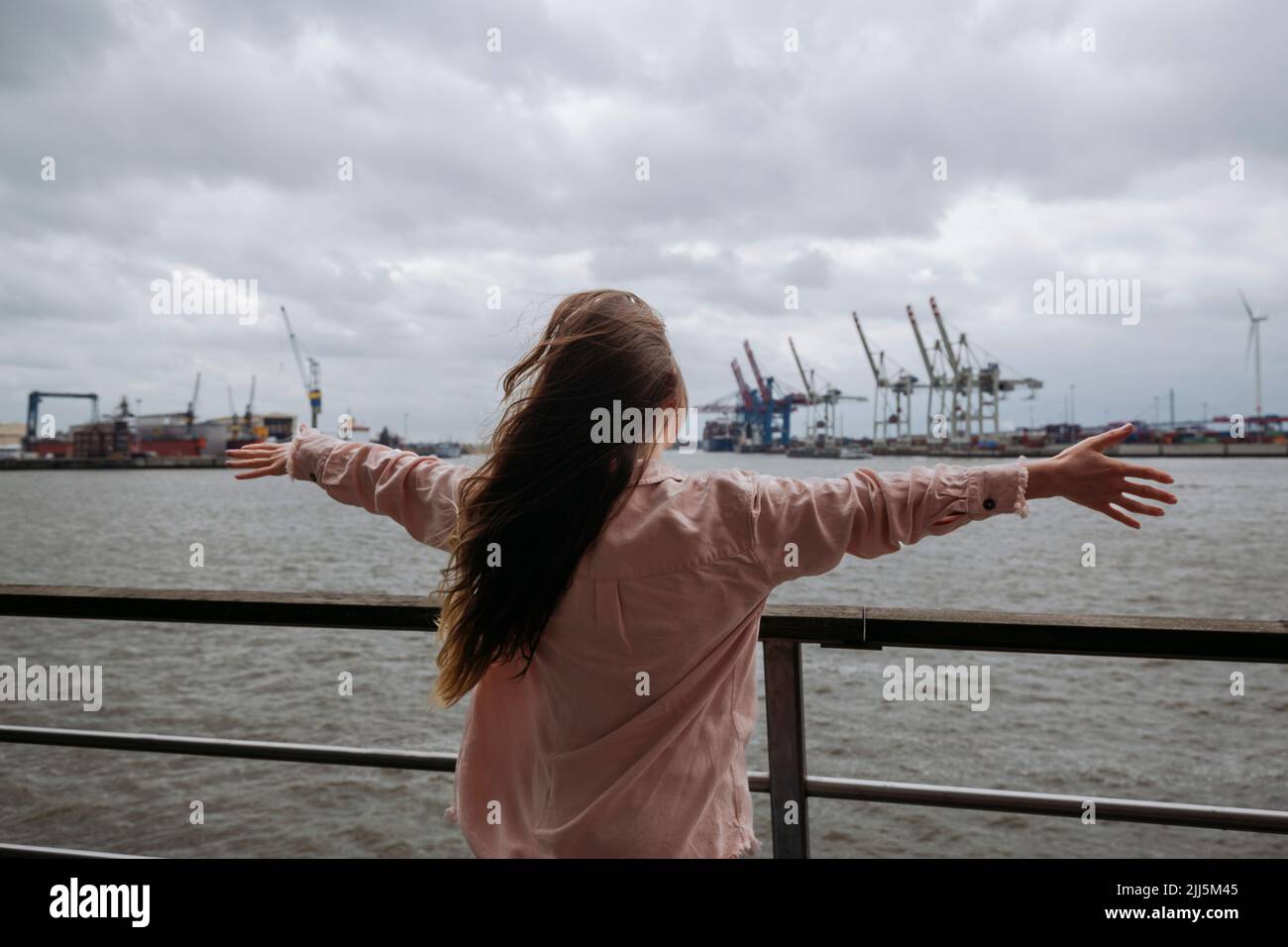 Woman arms outstretched port hi-res stock photography and images - Alamy