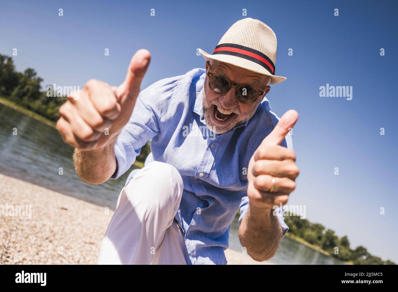 Happy man thumbs up hi-res stock photography and images - Alamy