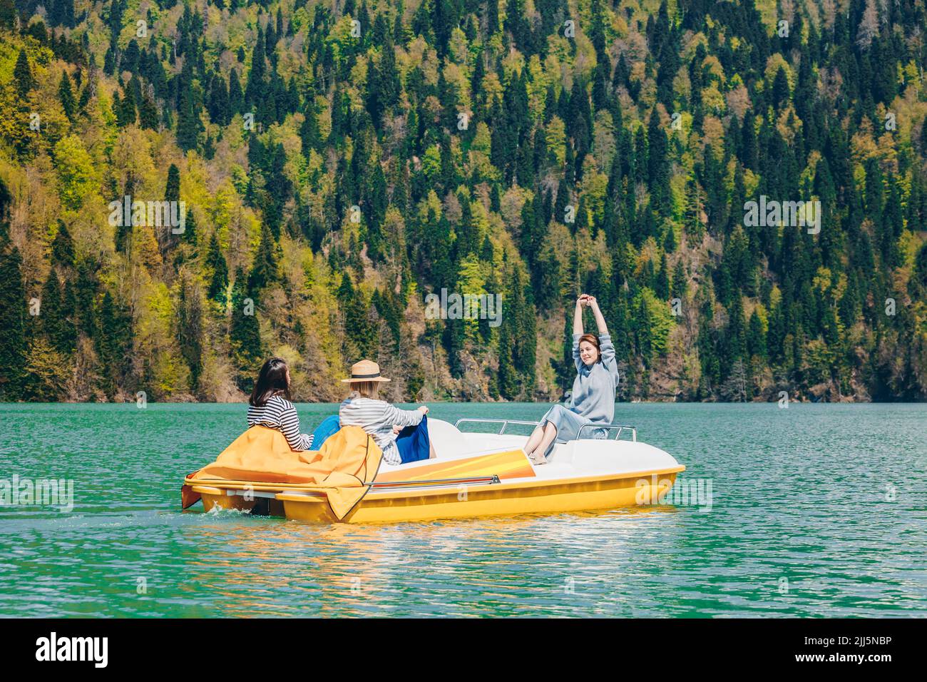 Water Riding Boat Women riding on pedal boat enjoying on Lake Ritsa Stock Photo - Alamy