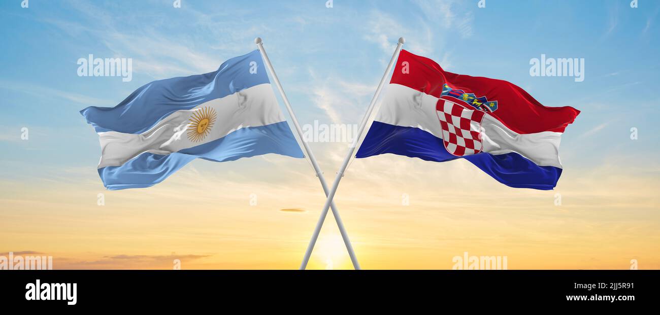 crossed national flags of Argentine and Croatia flag waving in wind at ...