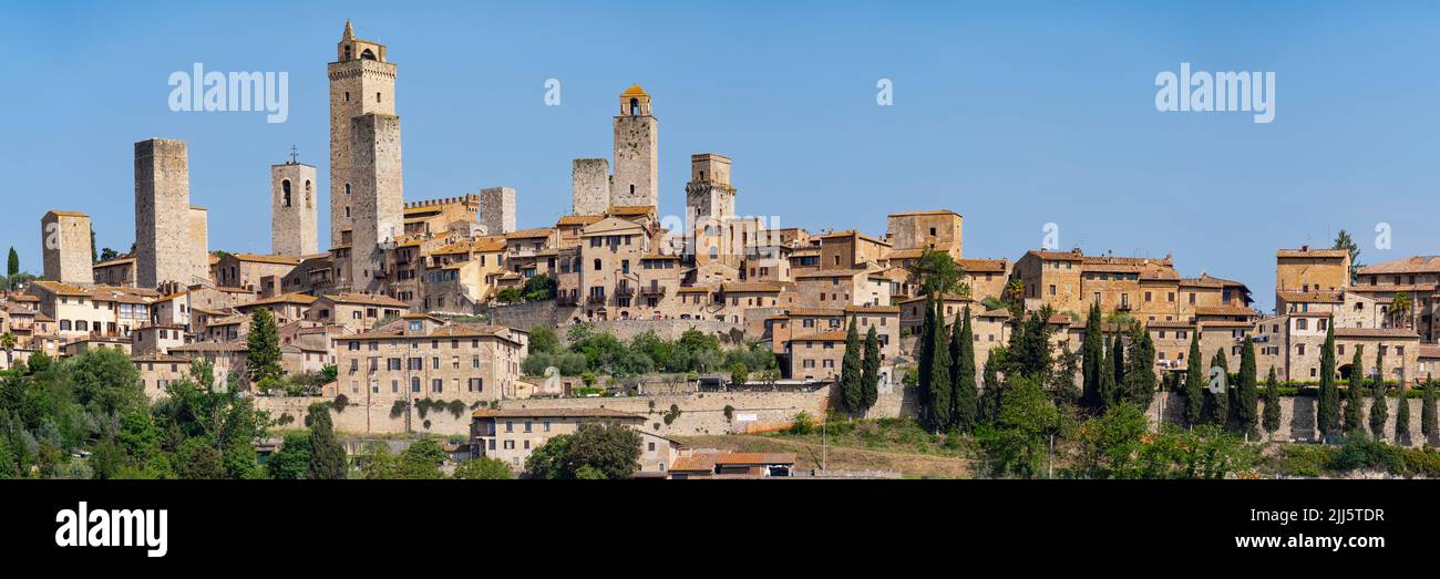 Italy, Tuscany, San Gimignano, Panoramic view of medieval town in summer Stock Photo