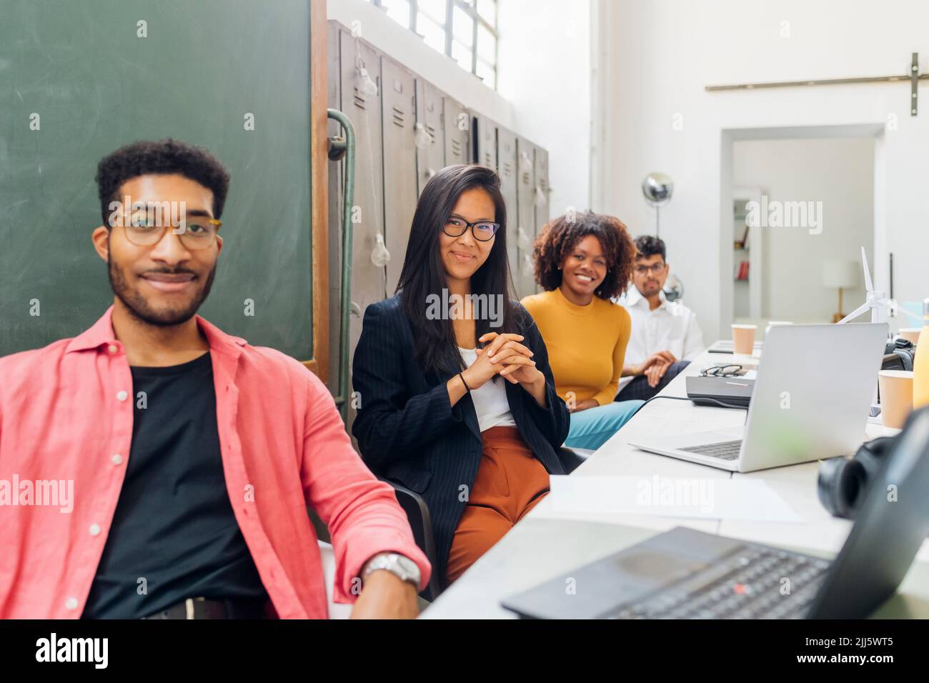 Seated woman in office meeting hi-res stock photography and images - Alamy