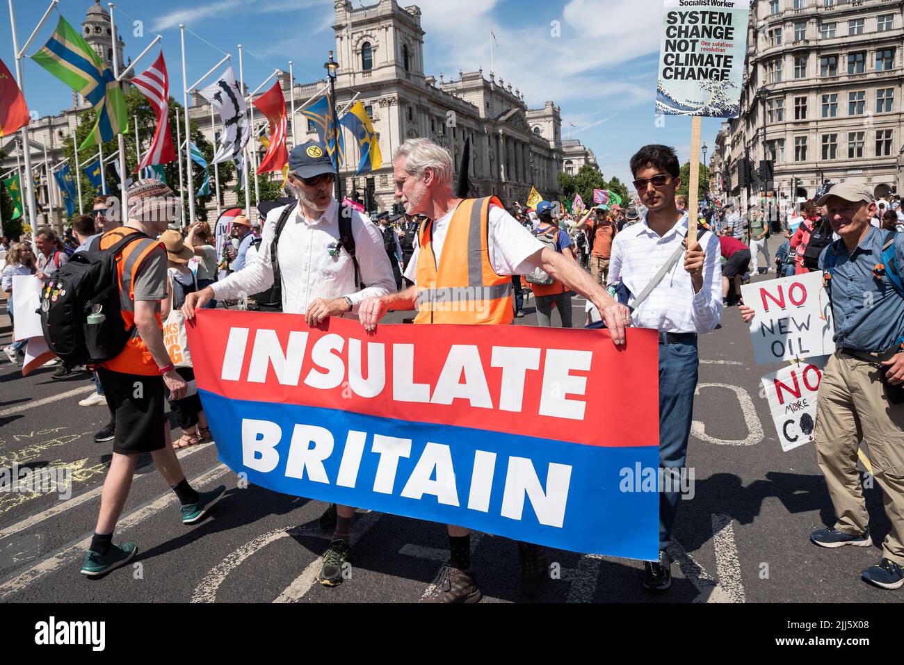 London, UK. 23rd July 2022. We All Want To Just Stop Oil Coalition: National March & Sit Down. One of many marches that converged upon Westminster. Marchers with Insulate Britain banner in Parliament Square. Credit: Stephen Bell/Alamy Live News Stock Photo