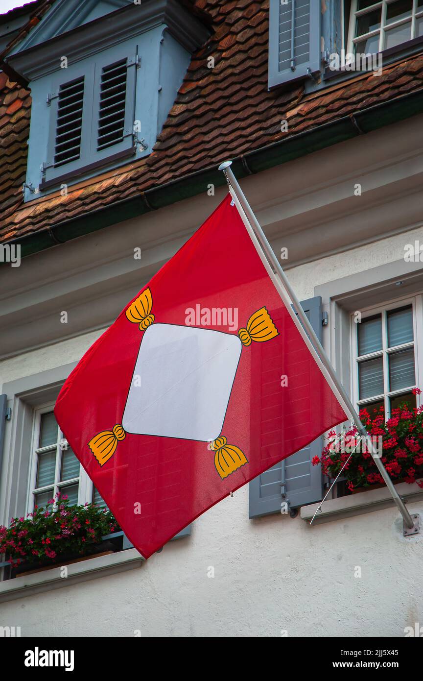 Kussnacht am Rigi, Switzerland - July 7, 2022: Municipal flag of Kussnacht am Rigi in the Swiss canton of Schwyz Stock Photo