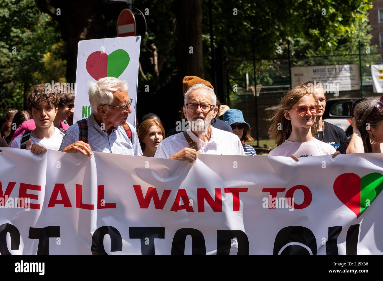 London, UK. 23rd July 2022. We All Want To Just Stop Oil Coalition: National March & Sit Down. Jeremy Corbyn joined the march at Angel tube. One of many marches converging upon Westminster. Jeremy Corbyn at head of march behind a Just Stop Oil banner. Credit: Stephen Bell/Alamy Live News Stock Photo