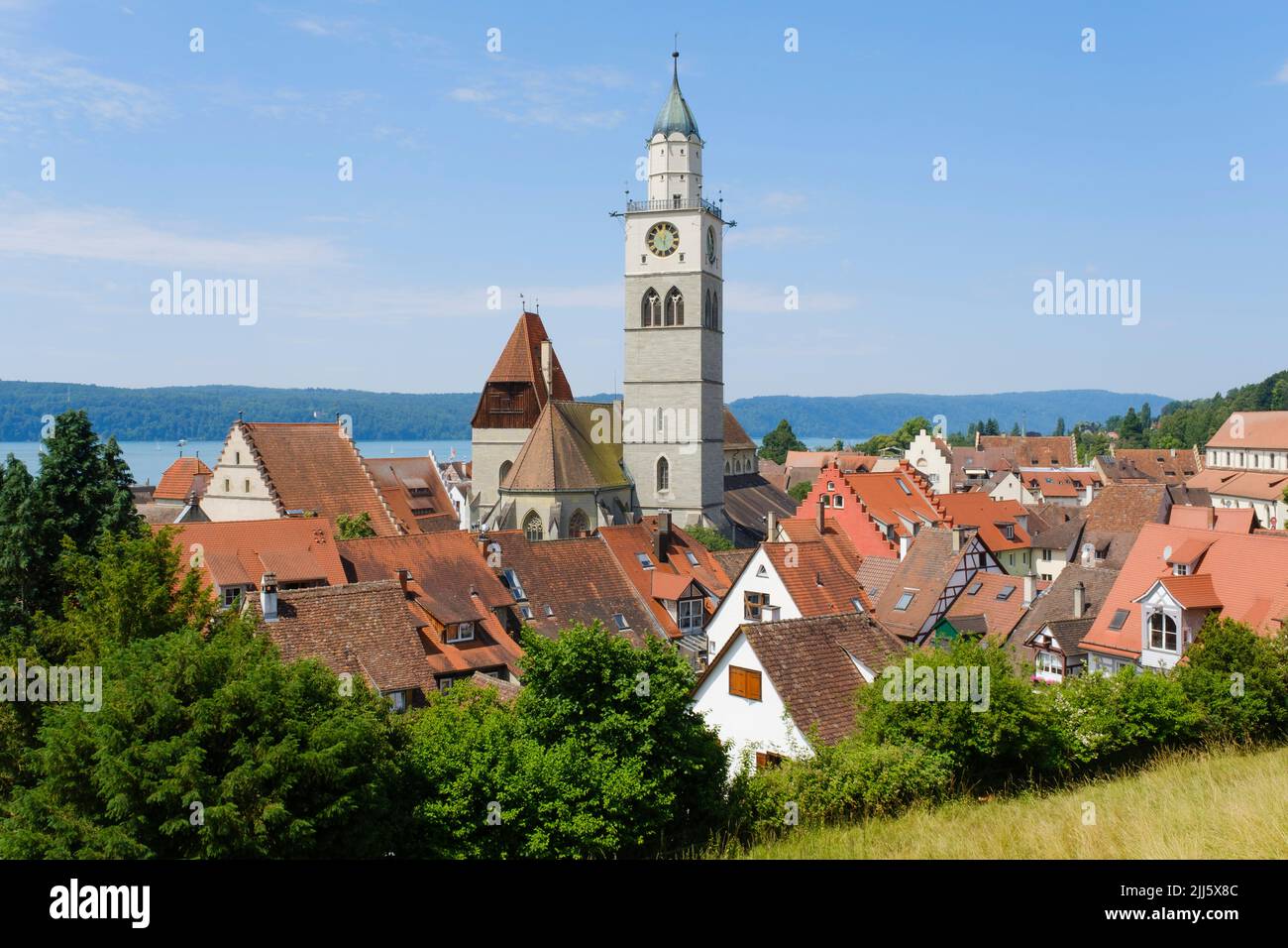 Germany, Baden-Wurttemberg, Uberlingen, Bell tower of Sankt Nikolaus church and surrounding houses Stock Photo