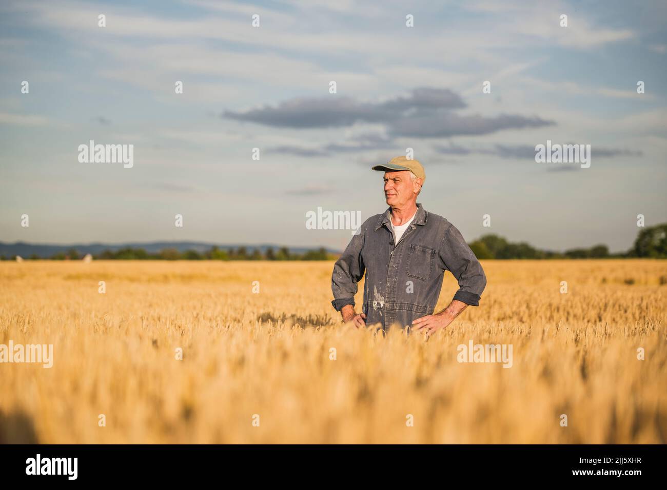 Farmer in coveralls hi-res stock photography and images - Alamy