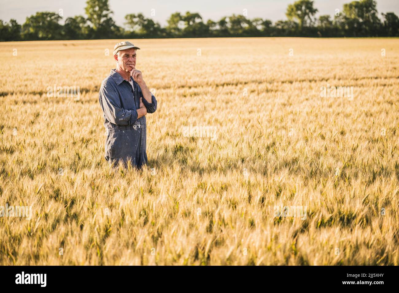 Farmer in coveralls hi-res stock photography and images - Alamy