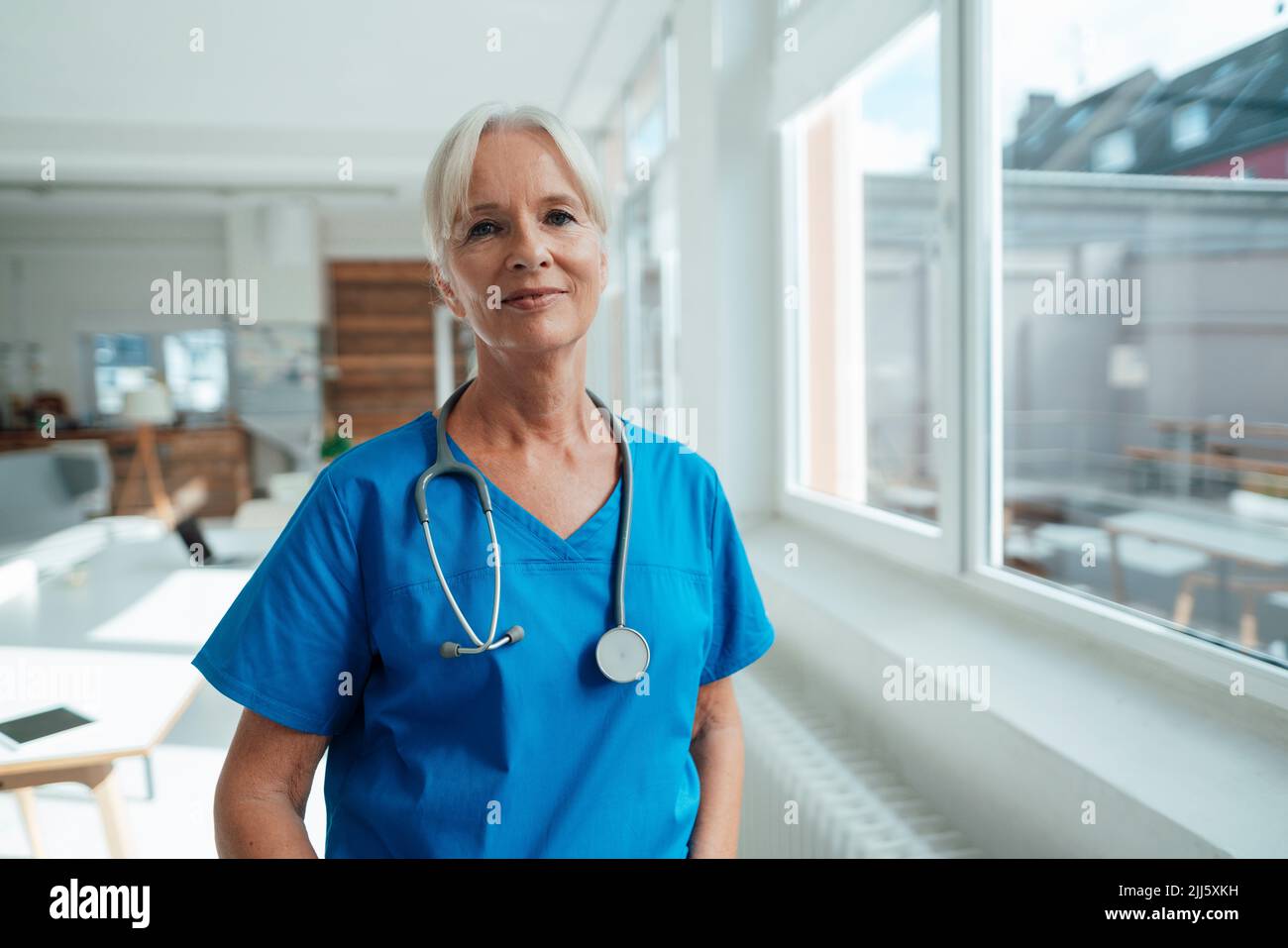 Female senior doctor with stethoscope Stock Photo - Alamy