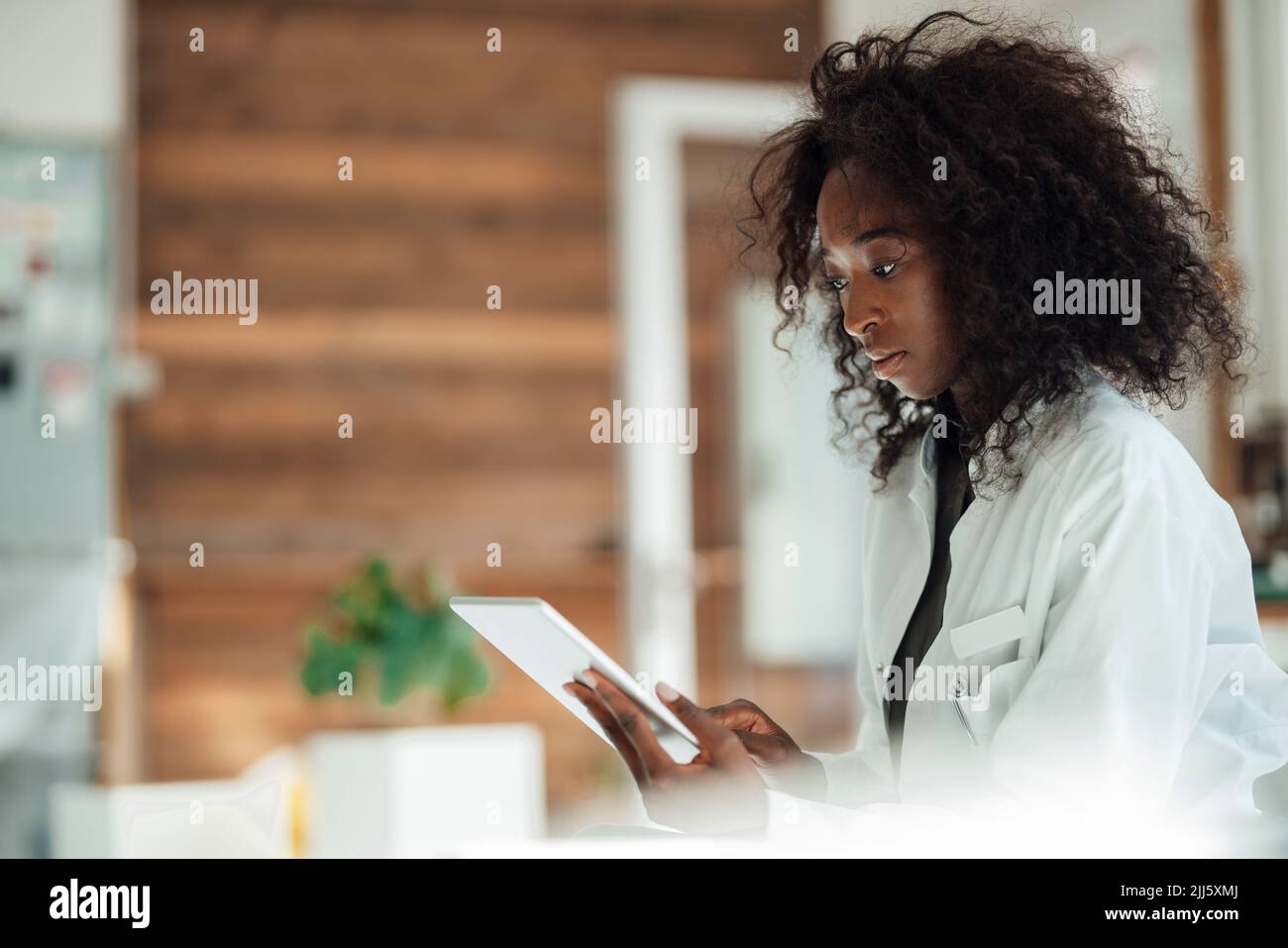 Female doctor using tablet PC Stock Photo
