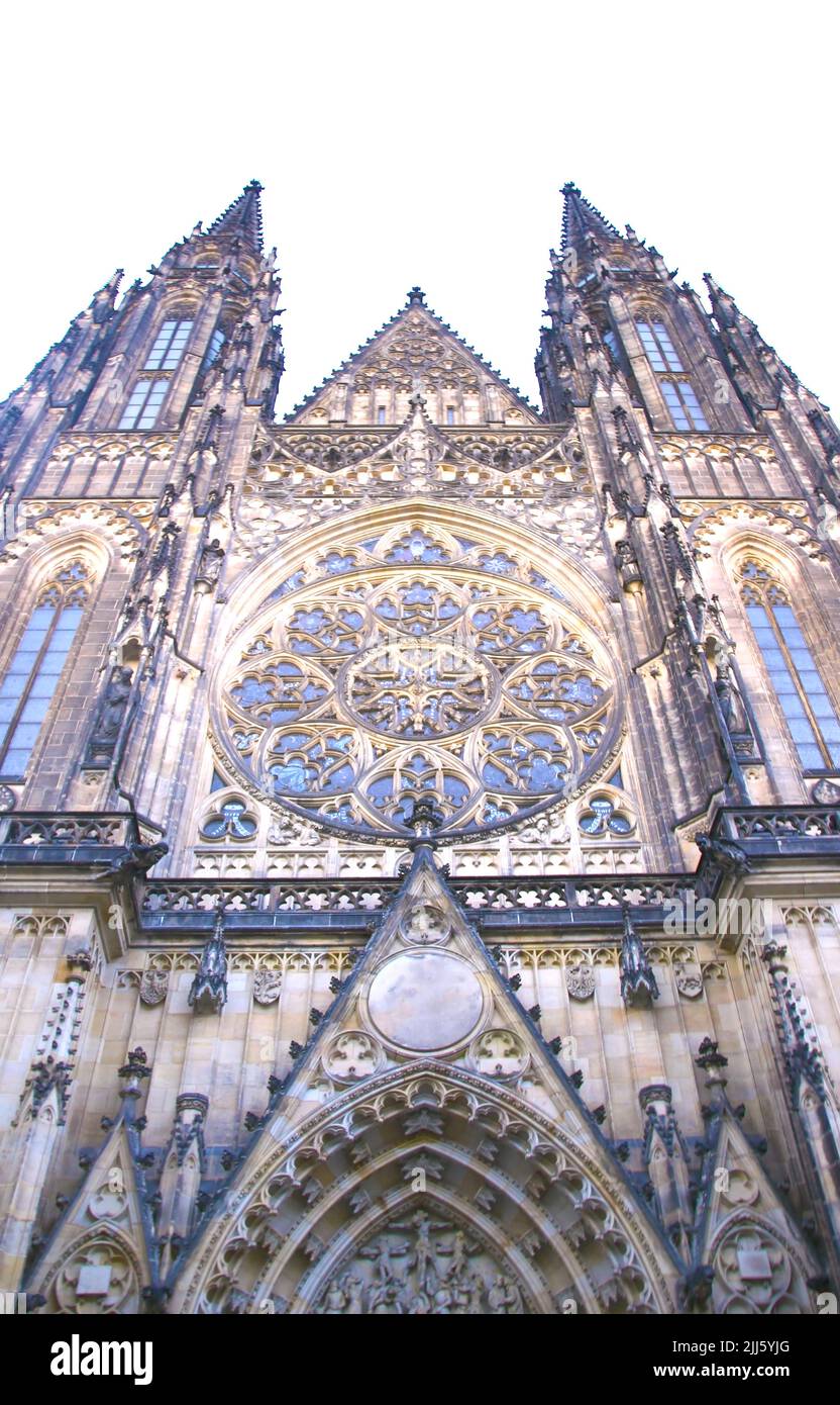Bottom-up view of an impressive Gothic-style cathedral, with ornamental details and semicircular arches. View on a sunny day Stock Photo