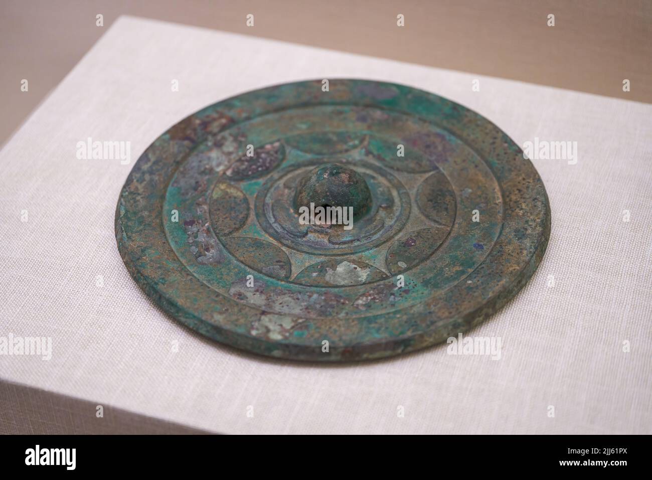Ancient Chinese Han Dynasty cultural relics in the museum, bronze mirror Stock Photo