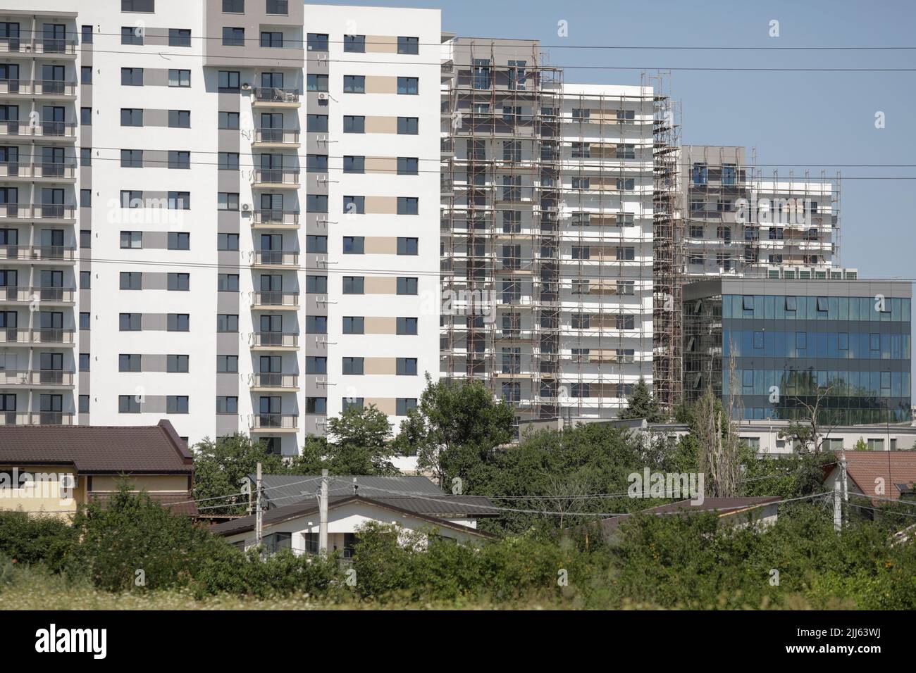 Bucharest, Romania - July 22, 2022: Newly built and still in construction blocks of flats in the Pallady area of Bucharest. Stock Photo