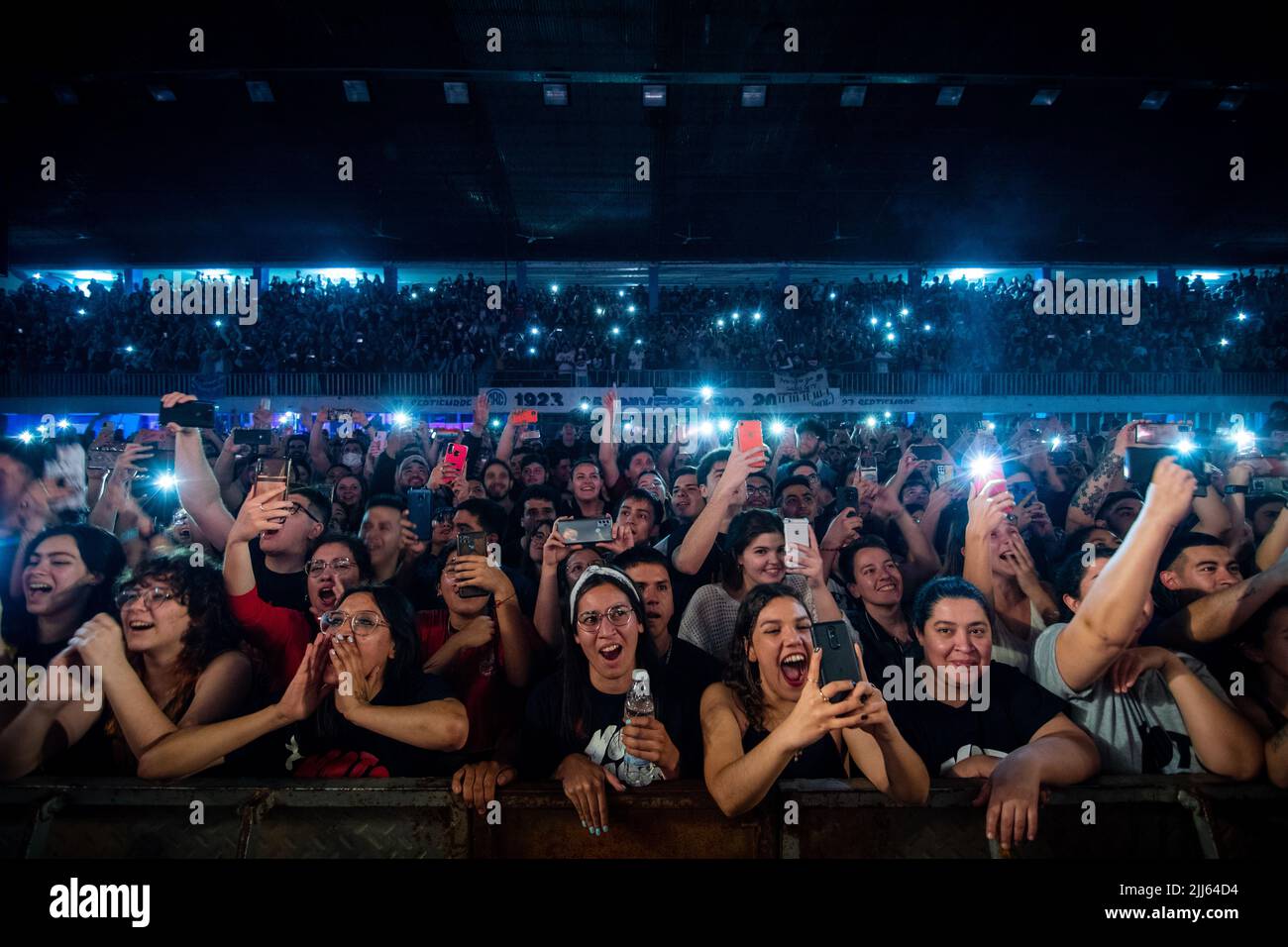 Crowd enjoy the music during the perform of the uruguayan rock band 'No te va a gustar'. Stock Photo