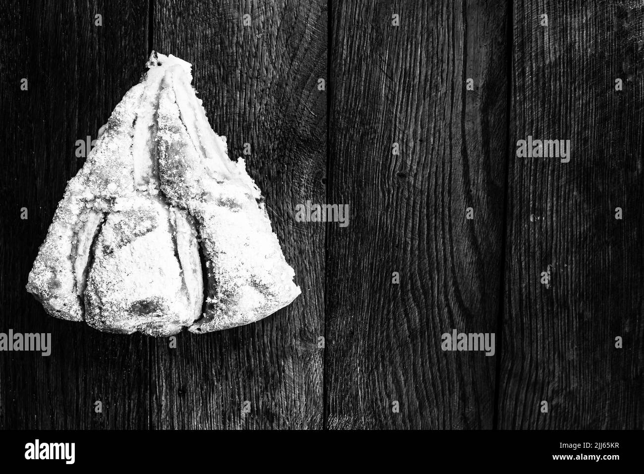 Sliced apple pie with cinnamon on rustic wooden table Stock Photo