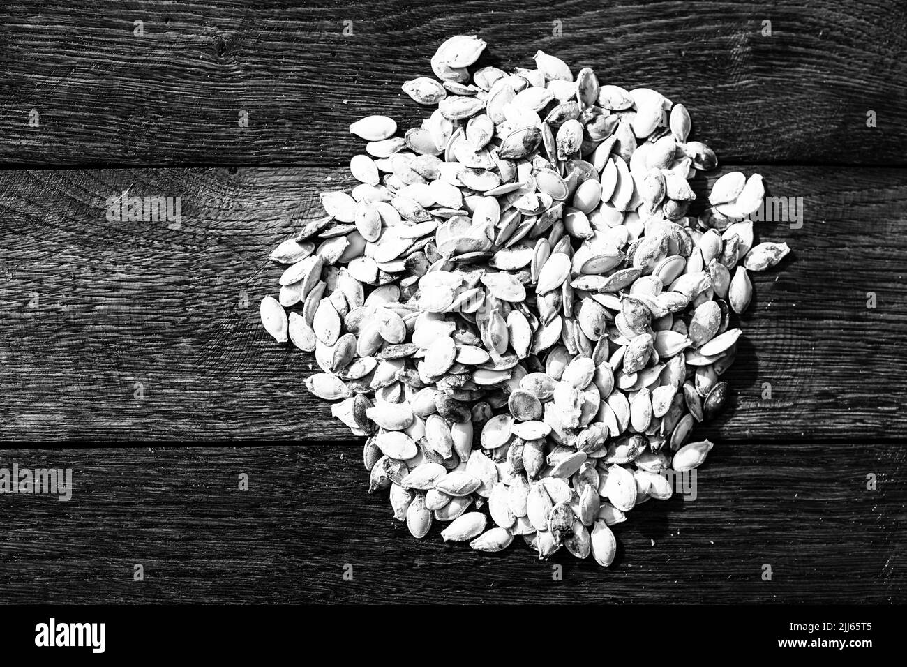 Sunflower seeds and pumpkin seeds Black and White Stock Photos & Images