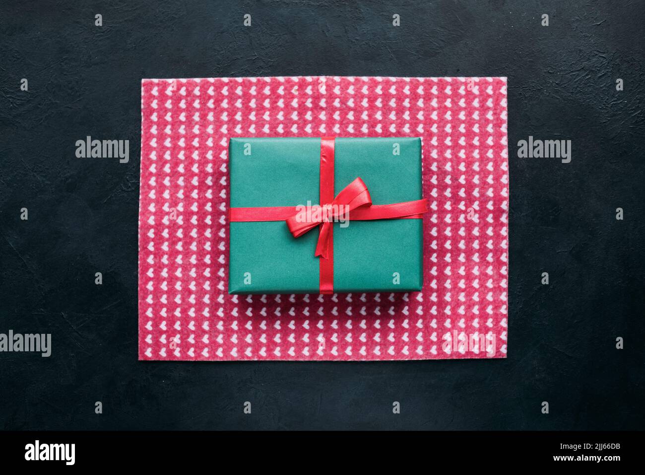 cute gift for beloved people on dark background Stock Photo