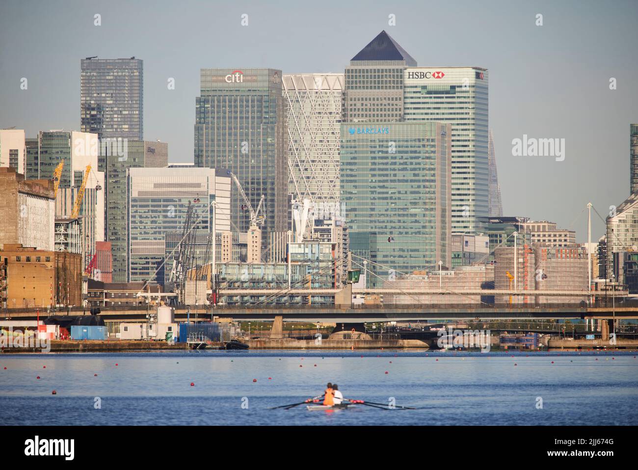 London Royal Albert Dock in Docklands area looking towards the business skyline of Canary Wharf Stock Photo