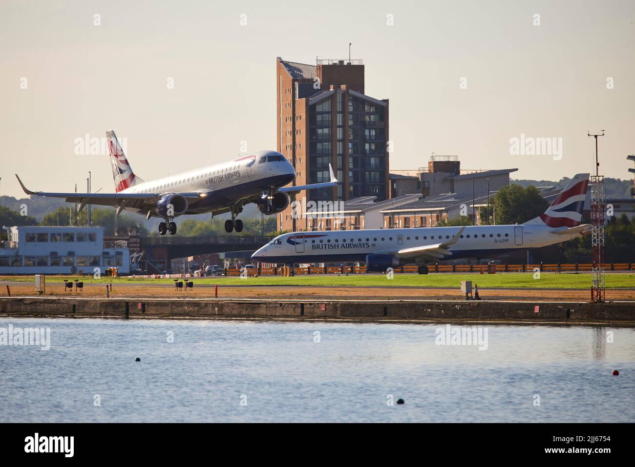 London Royal Albert Dock in Docklands across to London City Airport Stock Photo