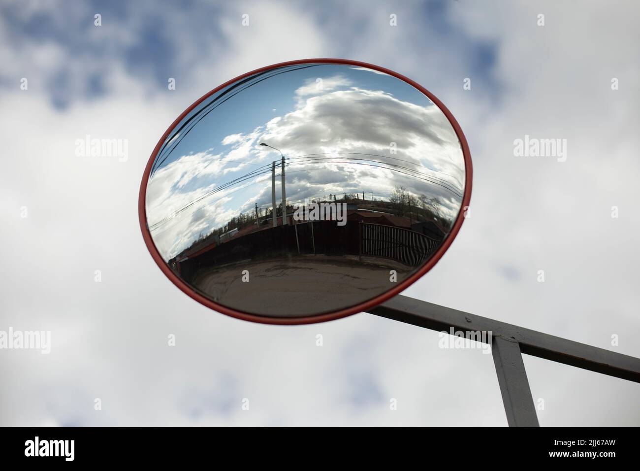 Round mirror. Reflector in parking lot. Mirror for safety. Reflective  surface Stock Photo - Alamy