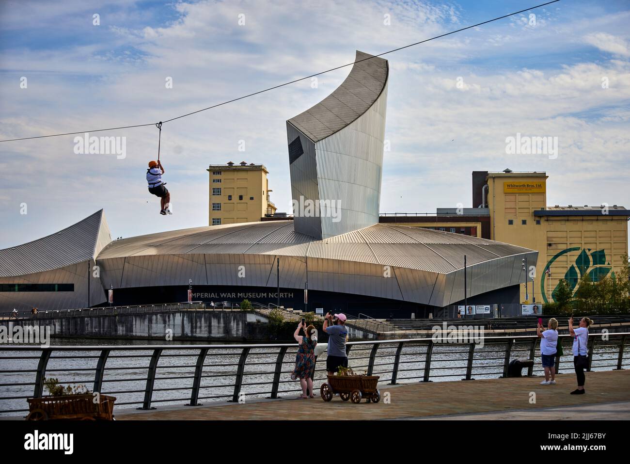 Salford Quays IWM North (imperial war museum north) and a zip line across the Manchester Ship Canal Stock Photo