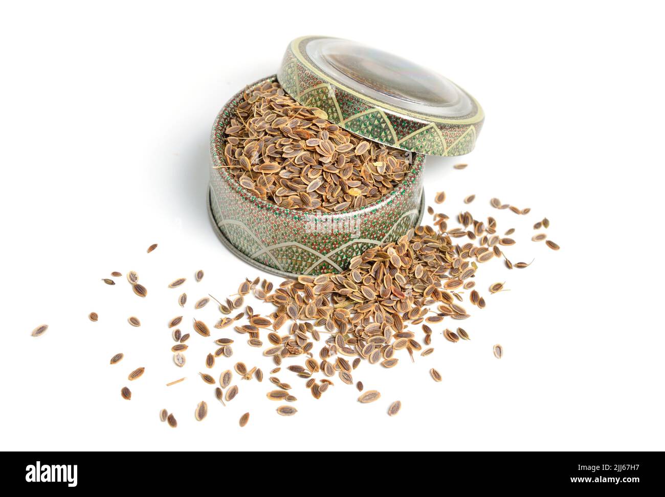 Stack of Dill seeds isolated on white background. Stock Photo