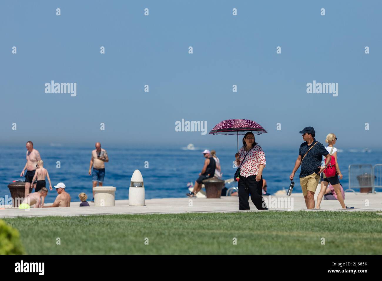 Tourists enjoy summer during a heat wave, in Zadar, Croatia, on July 23