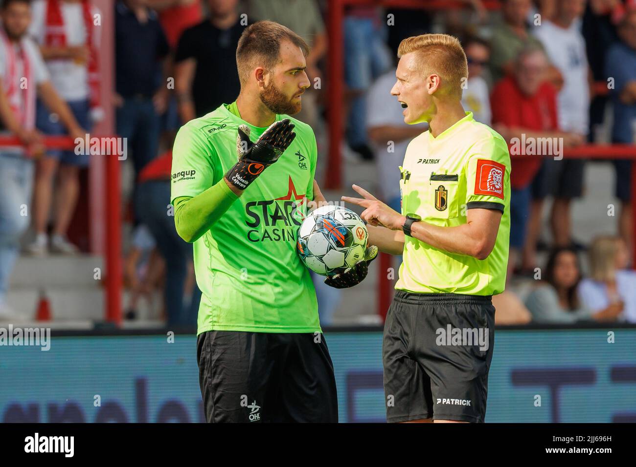 OHL's Valentin Cojocaru and referee Lothar D'Hondt pictured during a soccer match between KV